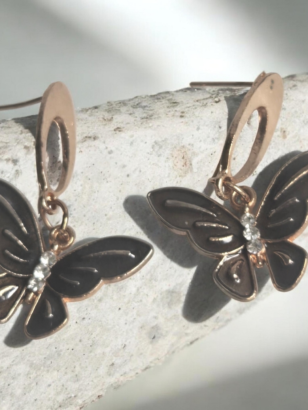 Gold Butterfly Drop Earrings with Black Enamel and Crystal Accents